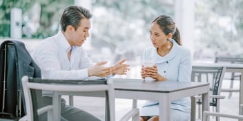 A Legal Divorce Coach Helping Someone and Giving them Advice on their Divorce