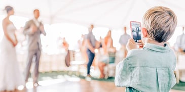 child taking photo on phone parent remarried