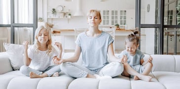 mom and kids in a moment of zen after resolving custody issues