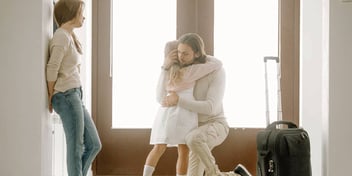 parent and child embracing