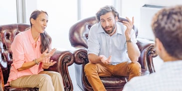 couple in marriage counseling arguing about one of many things