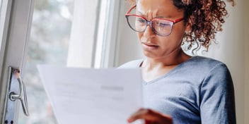 woman completing a divorce planning worksheet