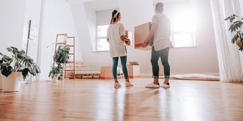 couple moving out of their mostly empty home