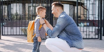 Dad gets his son ready for school