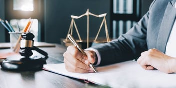 person writing a settlement conference statement